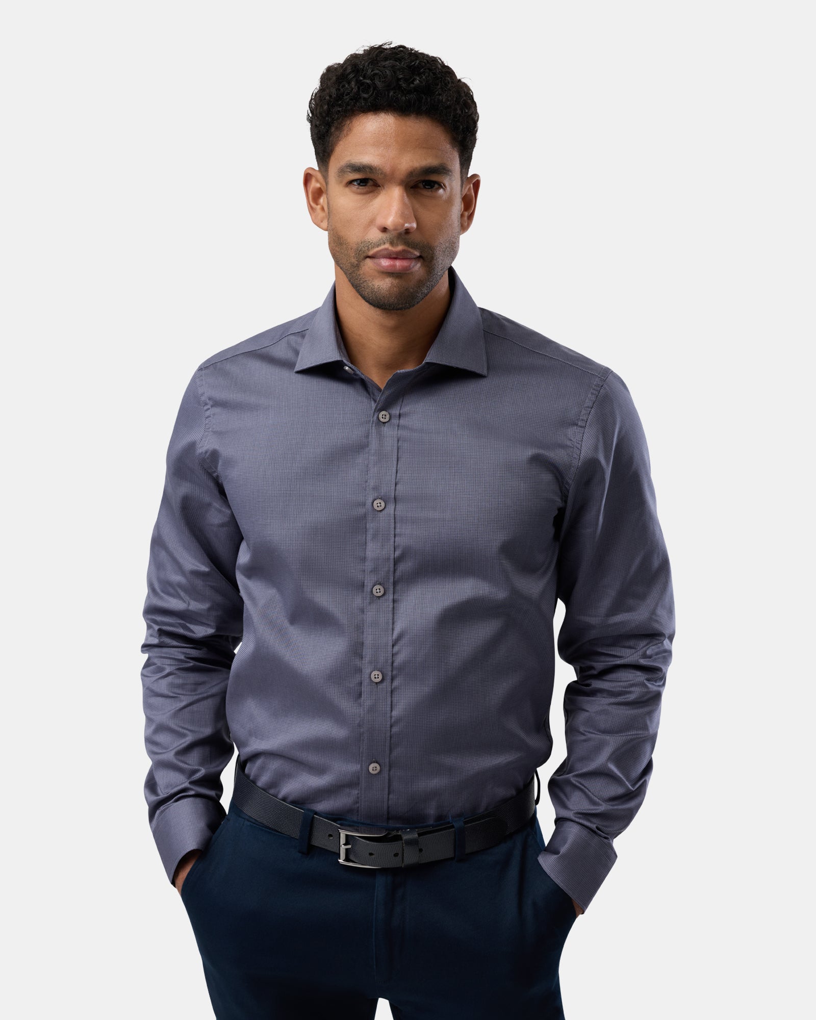 Front shot of man wearing grey subtly patterned slim-fit business shirt