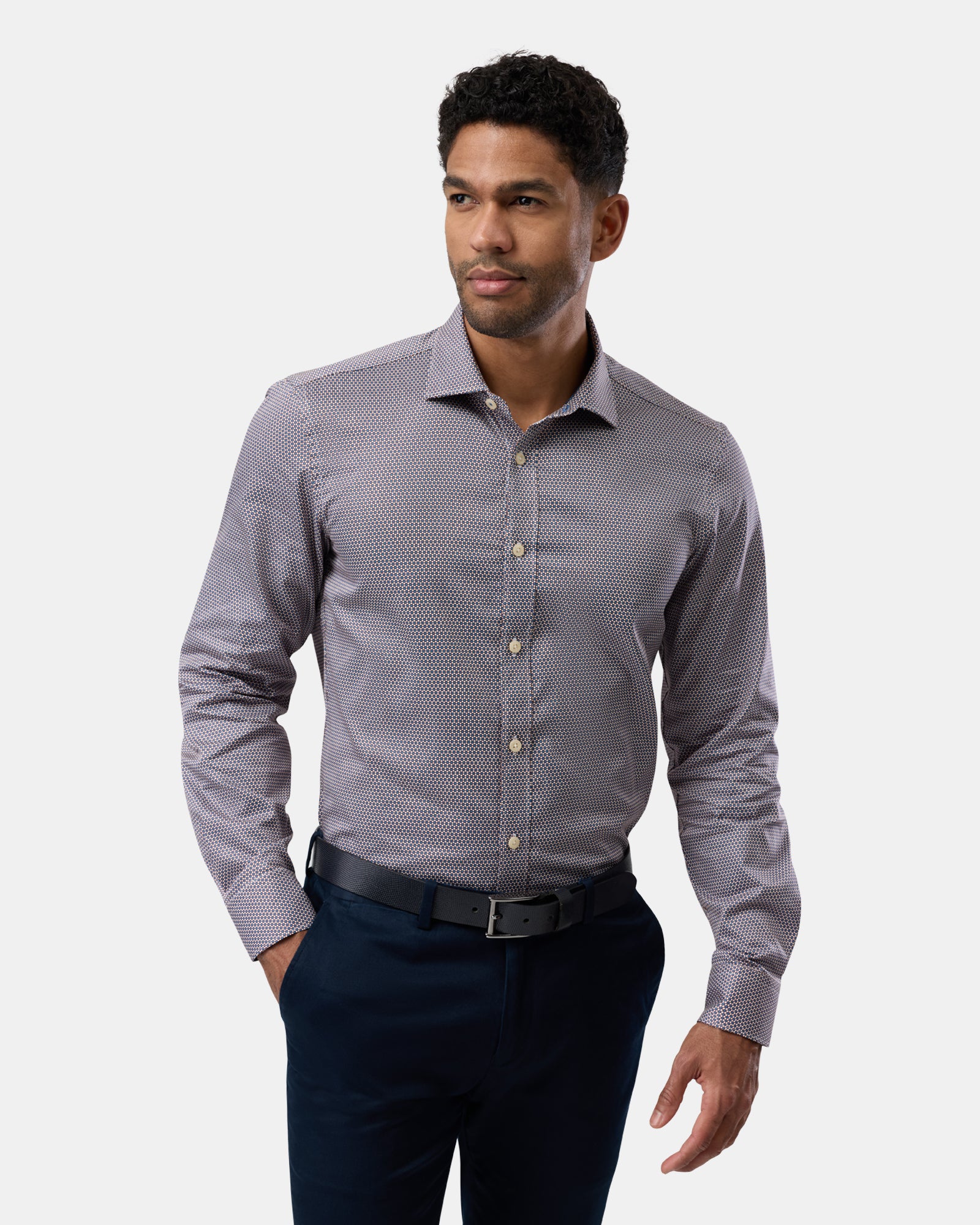 Front shot of man wearing brown slim-fit business shirt with subtle pattern