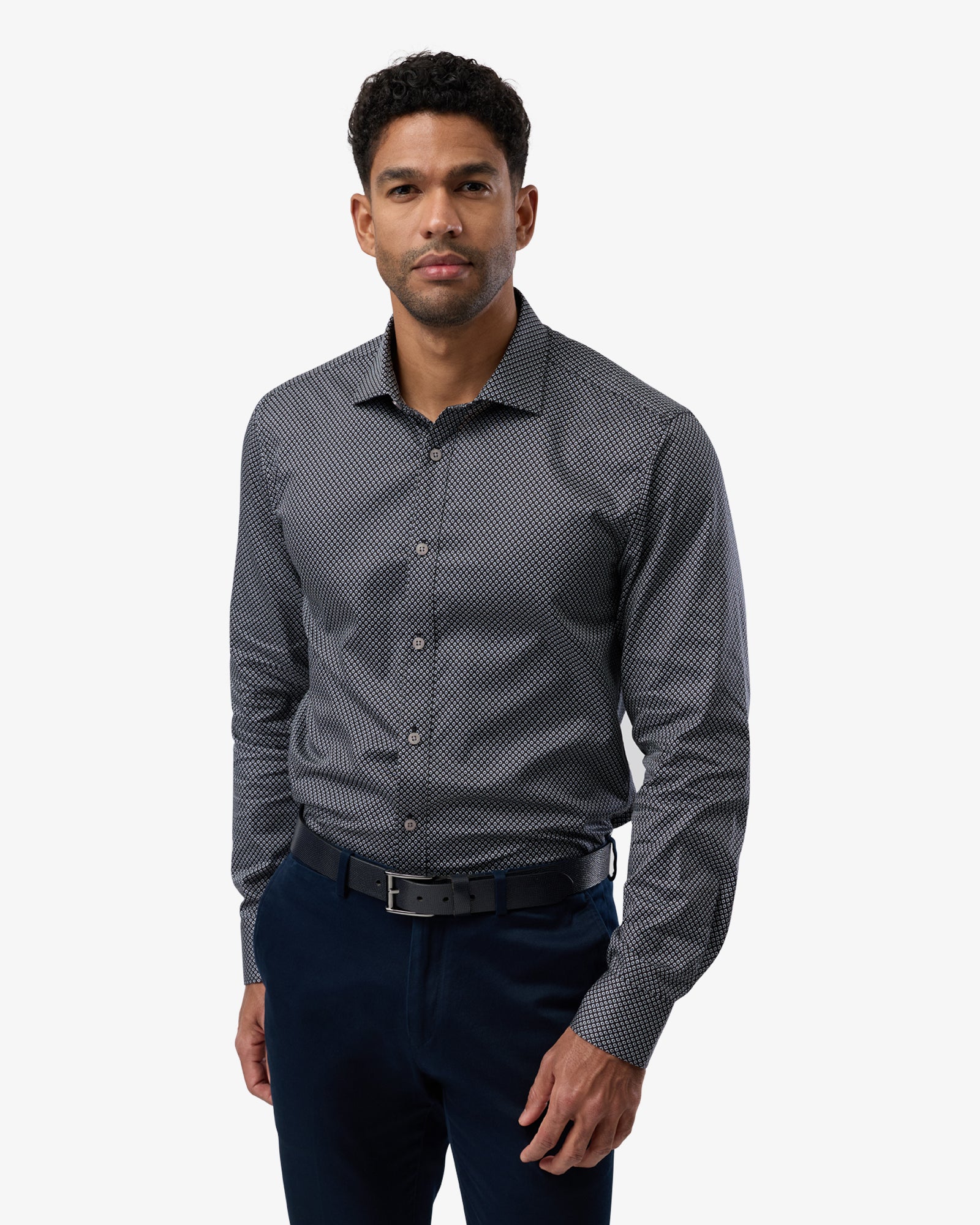 Front view of man in black luxe print business shirt, tailored slim fit