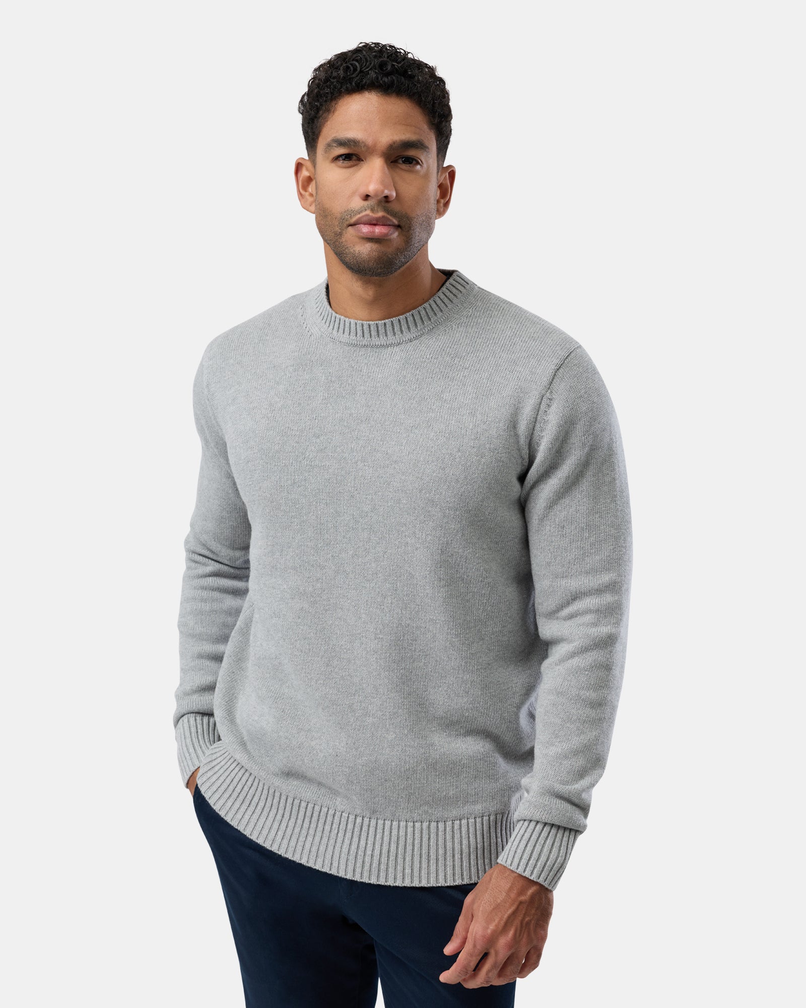 Man wearing a gray sweater