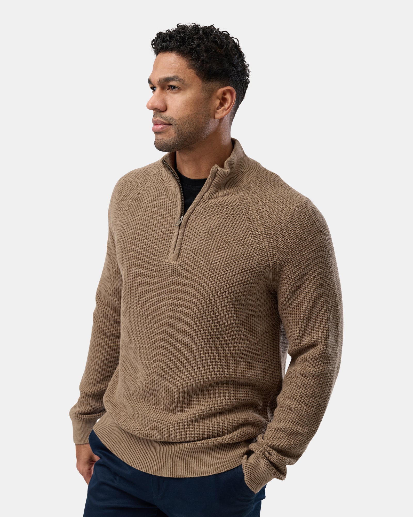 Male model in soft fawn half zip knit jumper