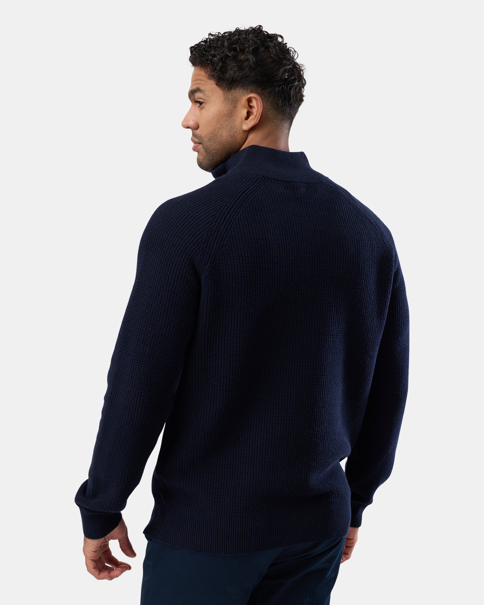 Classic navy cotton knit with half zip neckline on male, Rear view