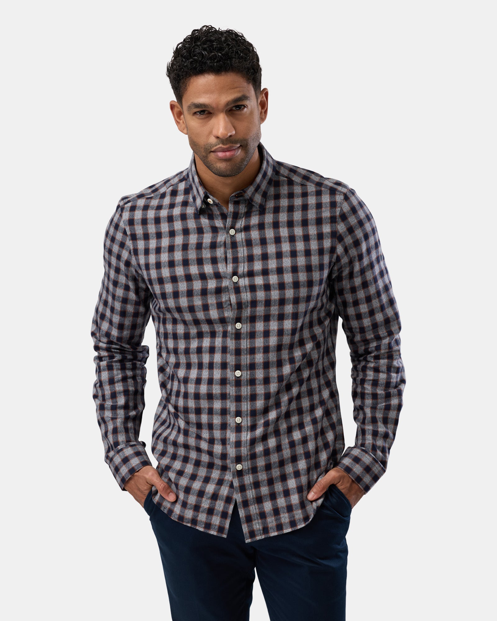 Front view of man wearing grey patterned long sleeve casual shirt