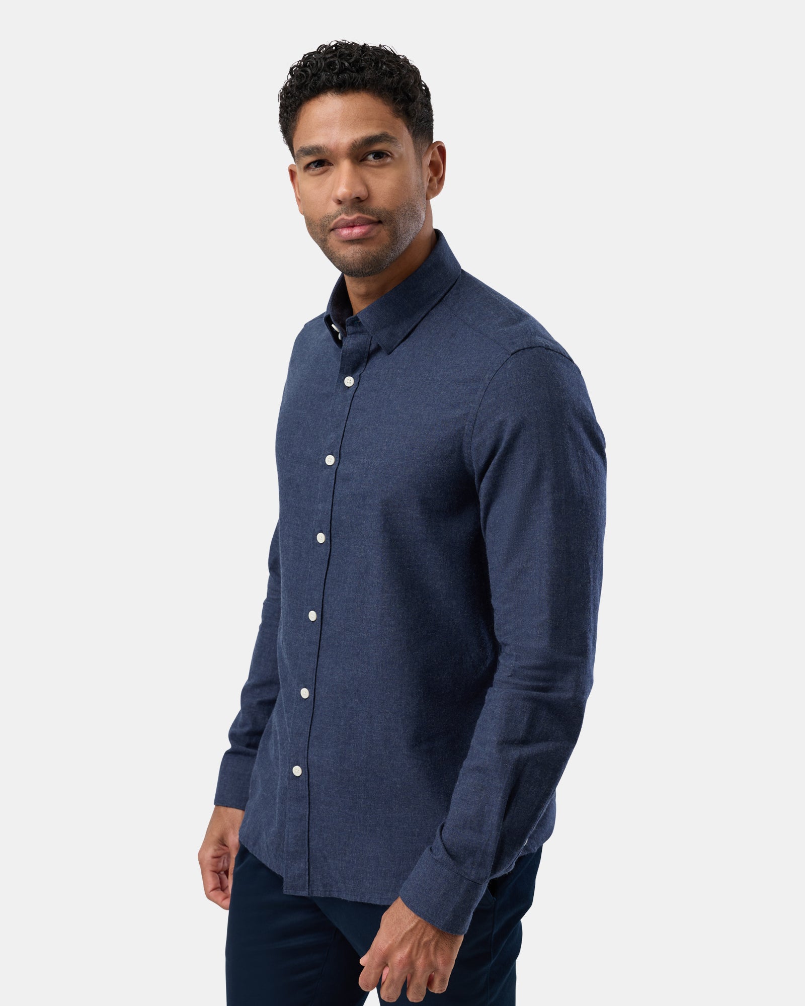 Side view of navy marl shirt, long sleeves with comfortable fit