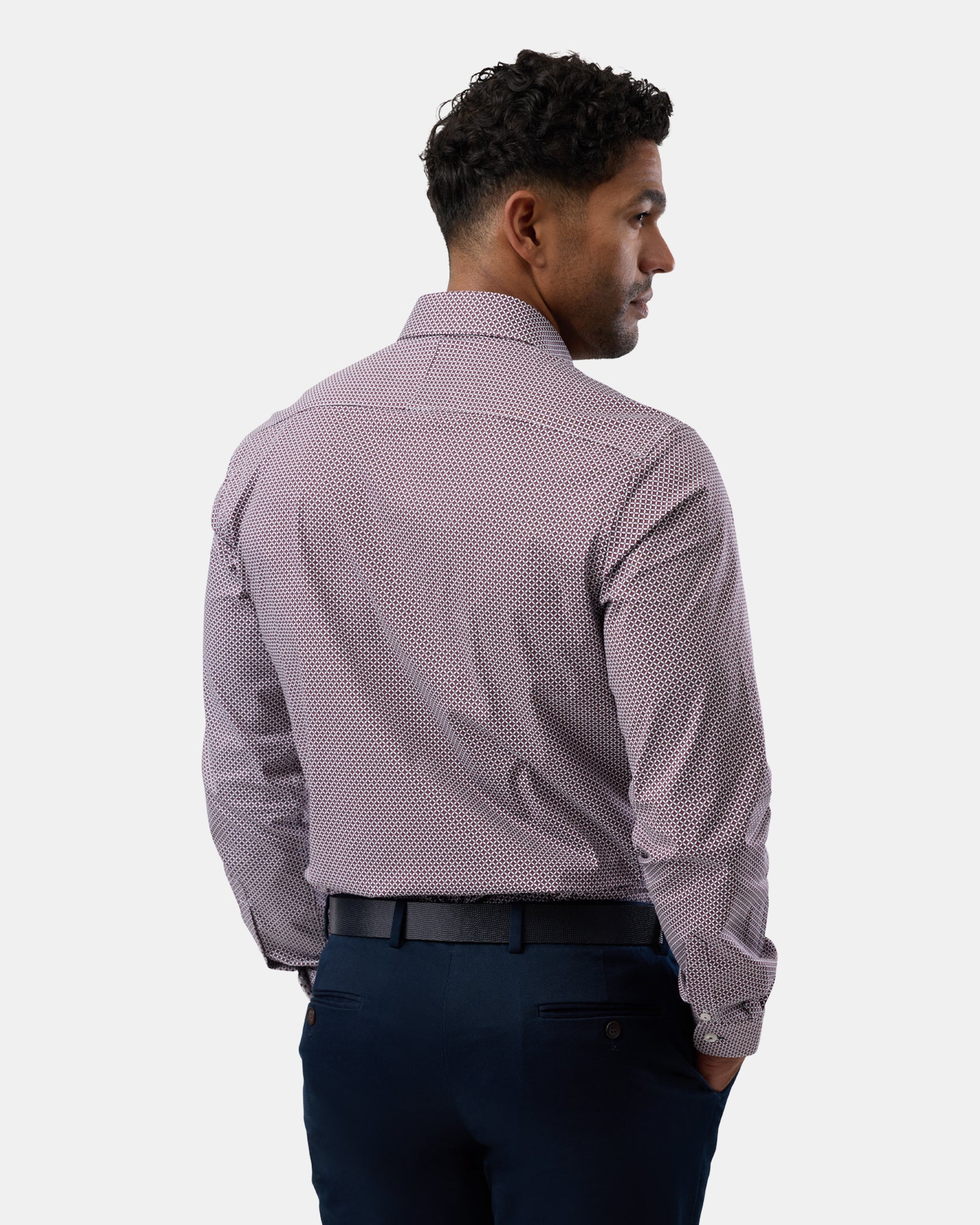 Back detail of burgundy shirt focusing on pattern alignment and stitching