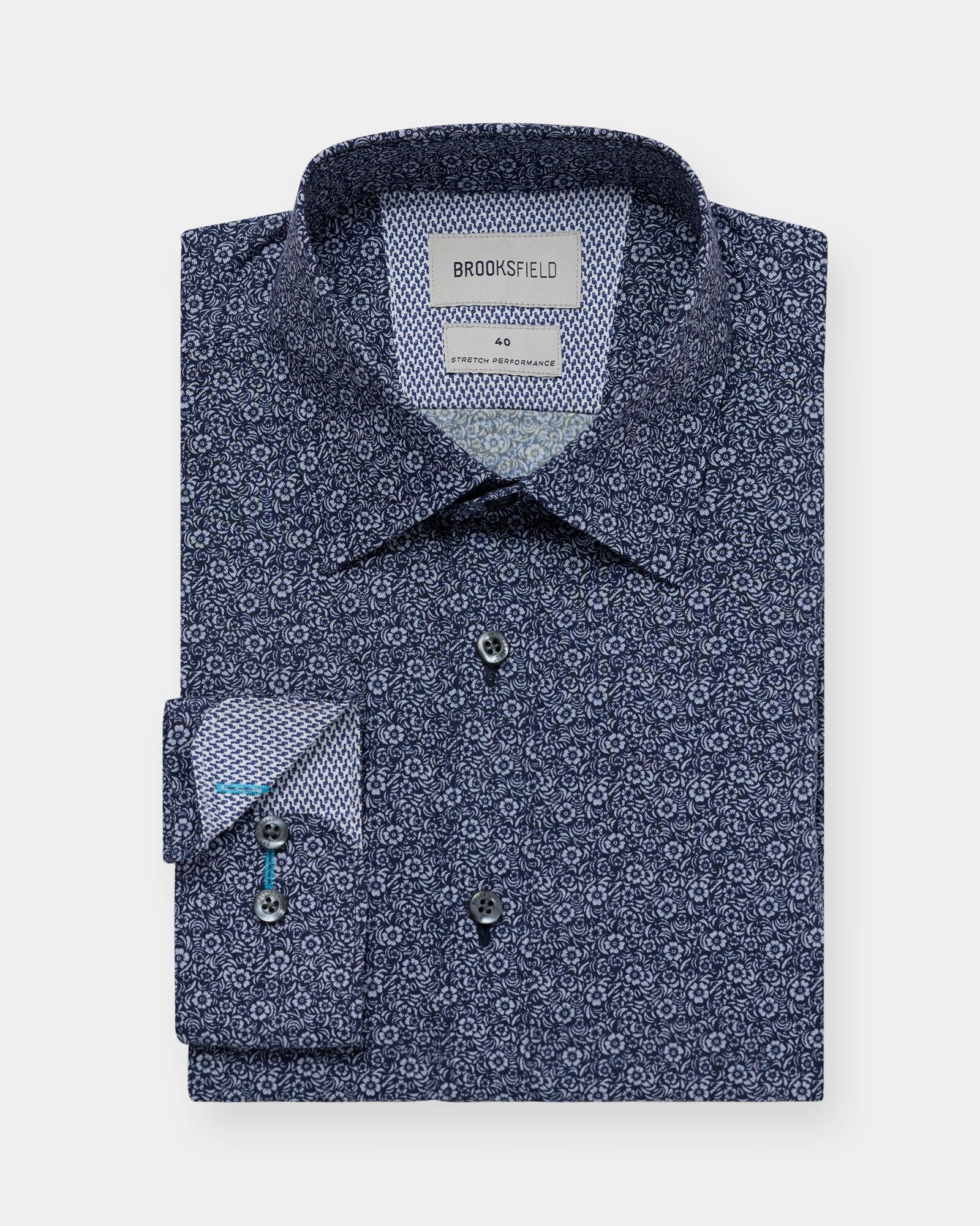 Straight-on view of a navy floral performance shirt
