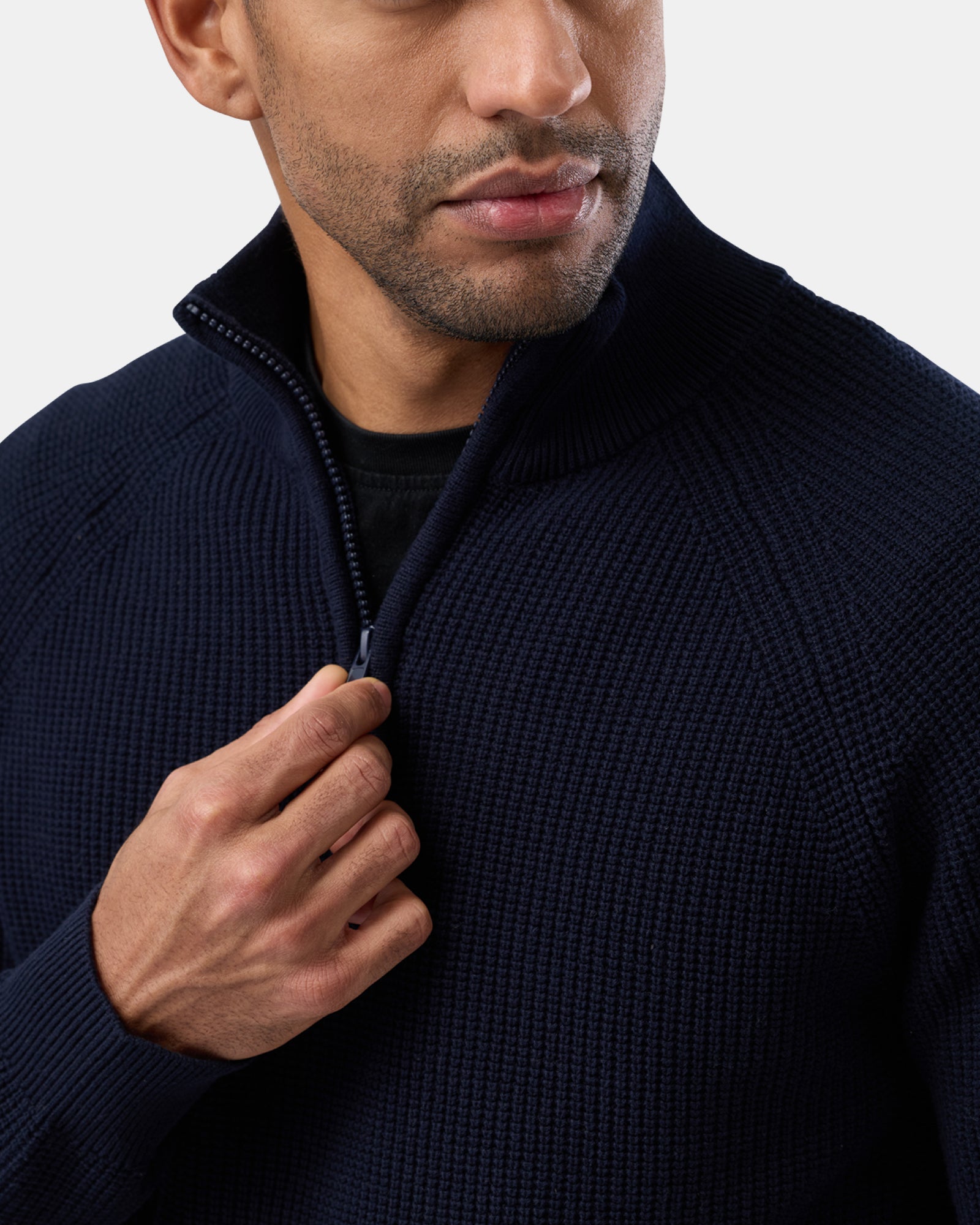 Close-up of navy half zip cotton sweater on male