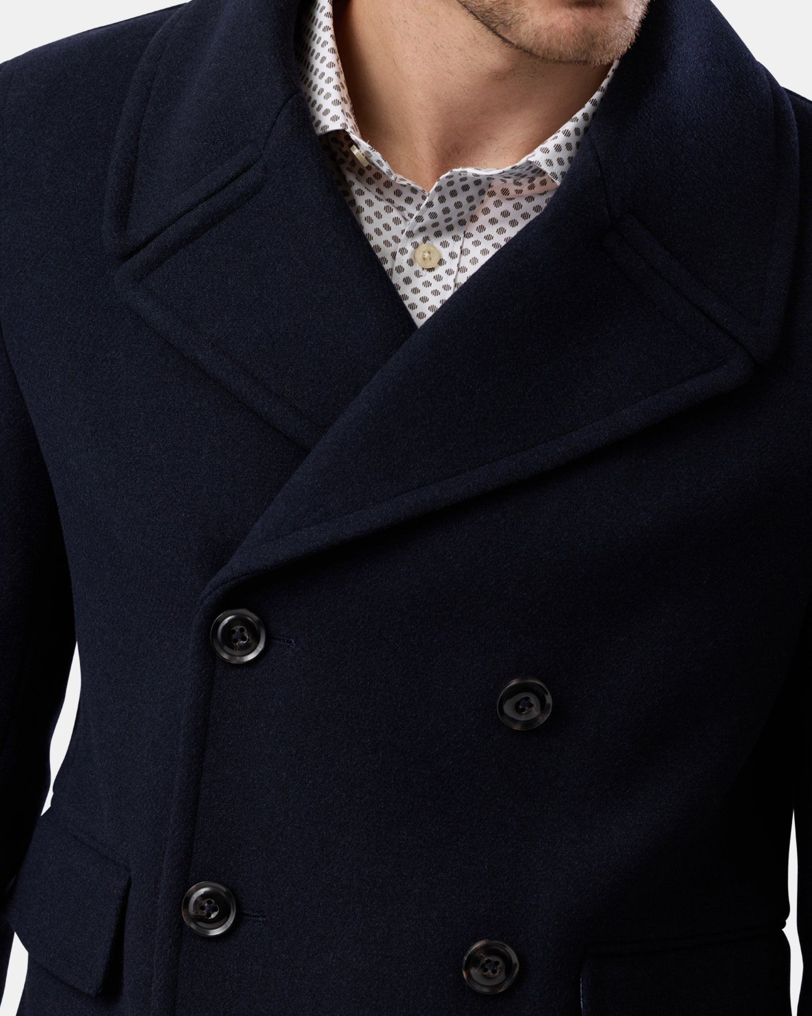 Close-up of navy wool blend peacoat on male